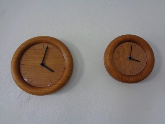 wall clocks in solid teak from boeckenhauer set of 2 1970s 12