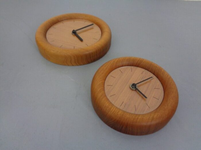 wall clocks in solid teak from boeckenhauer set of 2 1970s 4