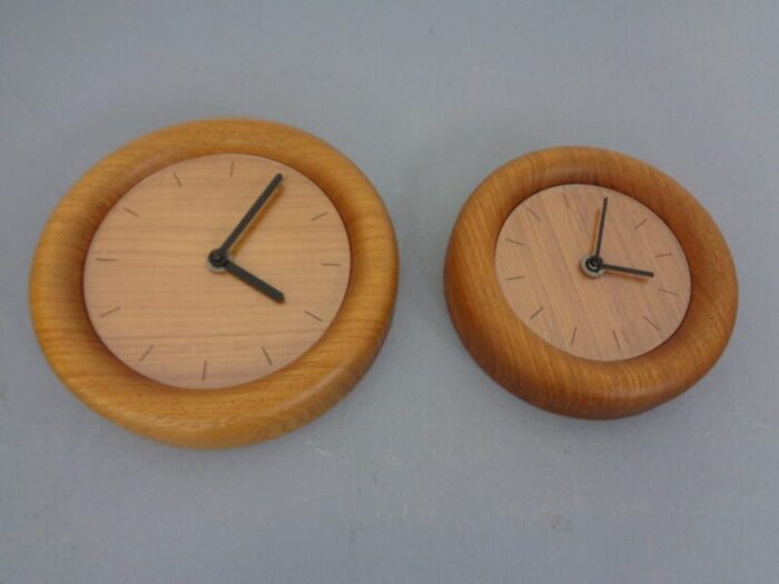 wall clocks in solid teak from boeckenhauer set of 2 1970s 8