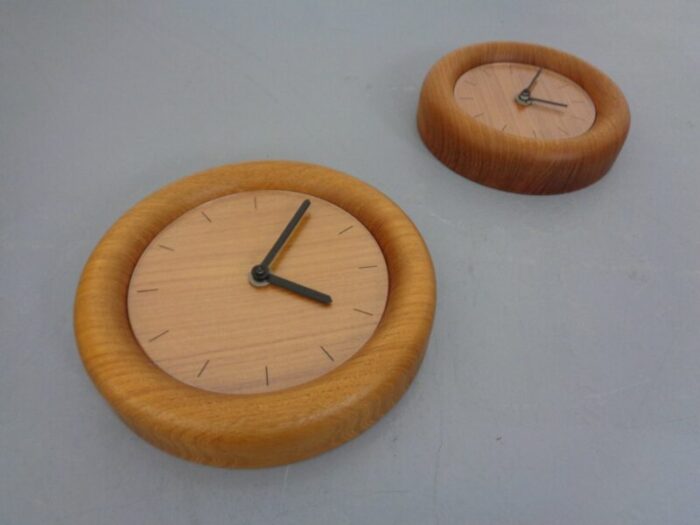 wall clocks in solid teak from boeckenhauer set of 2 1970s 9